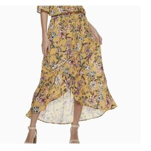 Live To Be Spoiled hi-low skirt. Yellow with flowers med